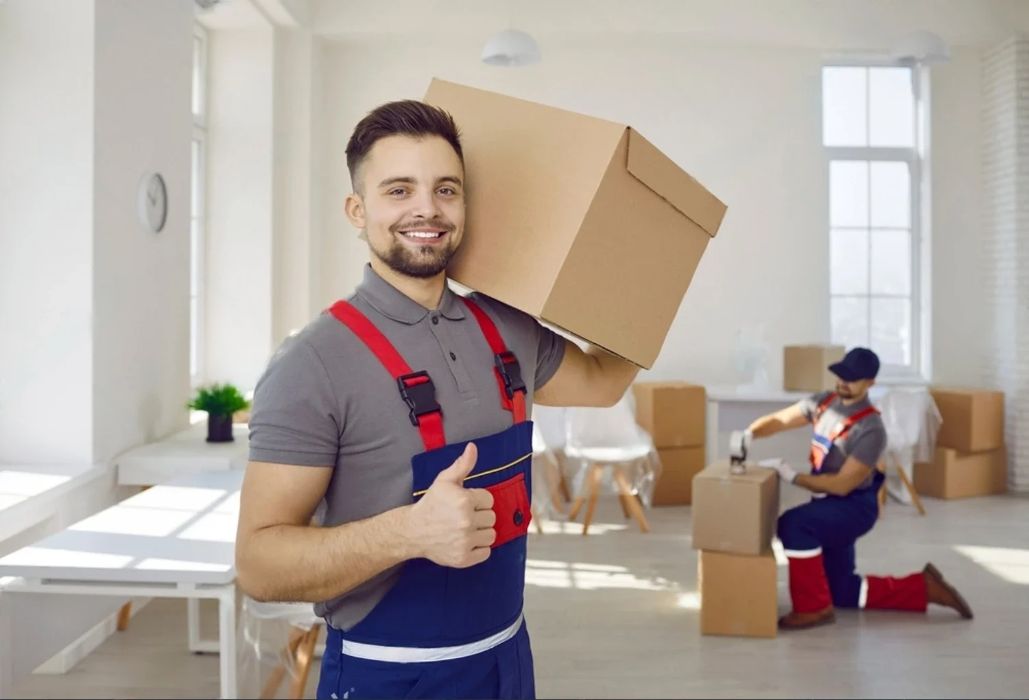 Professional movers and packers in Abu Dhabi handling furniture
