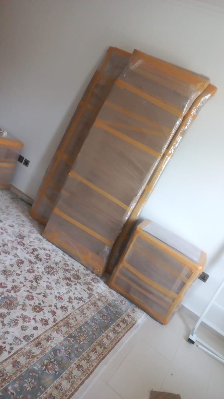 House movers and packers loading a home move in Abu Dhabi