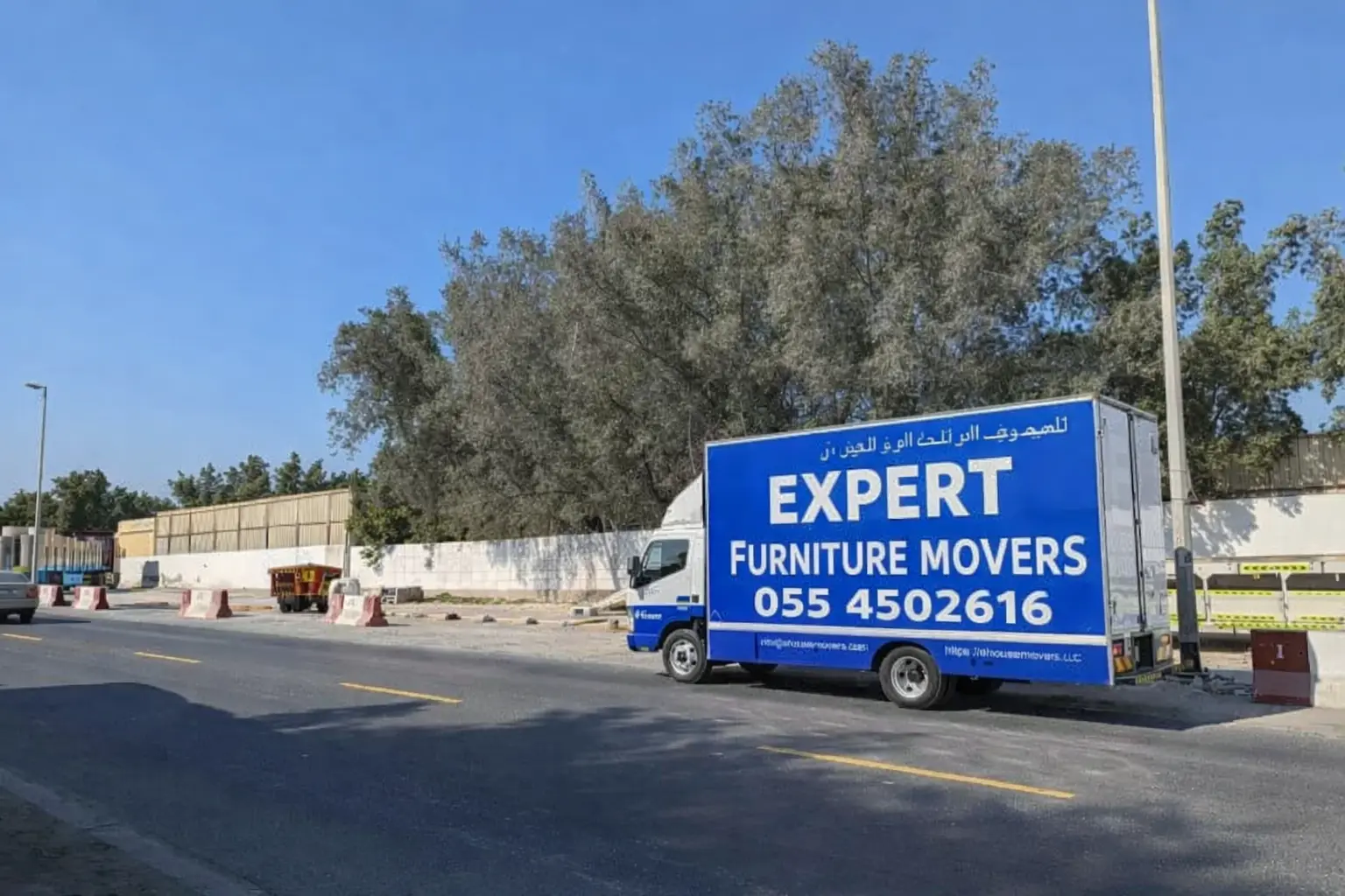 Expert Furniture Movers truck loading during a move in Al Rayyana Abu Dhabi